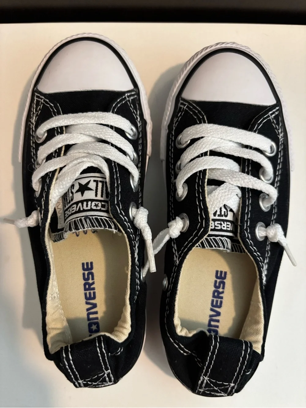 Kid’s Converse Black and White Unisex Low-Top Canvas Sneaker Pair